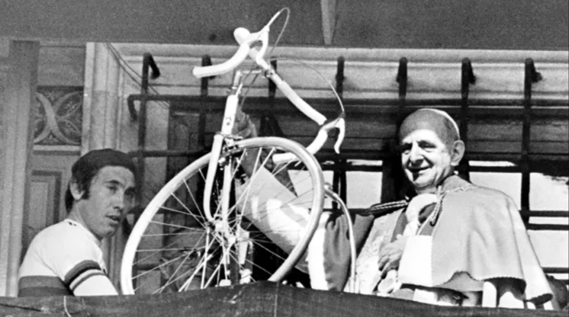 Pope Pius X blessing a bicycle
